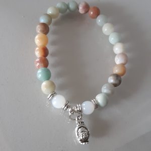 mala calcedoine mate tête de bouddha dans main