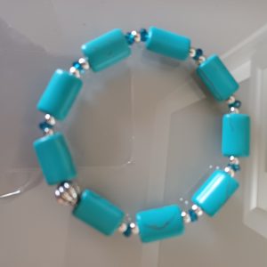 Mala  turquoise et strass bleu